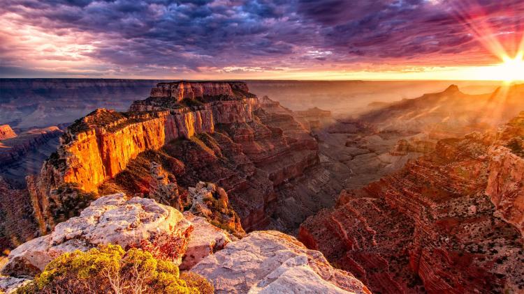 Grand Canyon National Park lights and layered canyon walls at golden hour