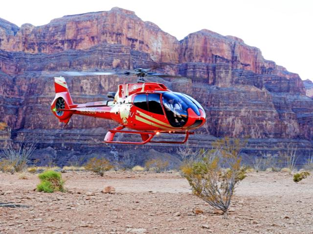Helicopter Landing with Hoover Dam Rafting Adventure in Grand Canyon air tours
